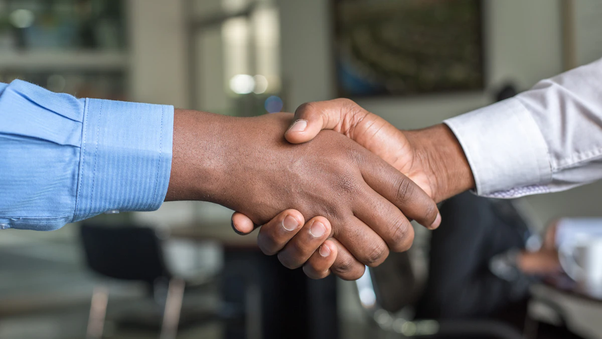 Business consultant reviewing growth plans with a small business owner at a table